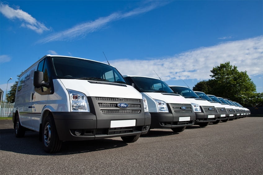 A fleet of Ford Transit vans