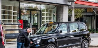 Government announces tax breaks for electric taxis LEVC London taxi being plugged in | The Van Expert