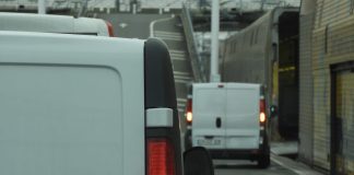 vans entering Euro Tunnel train